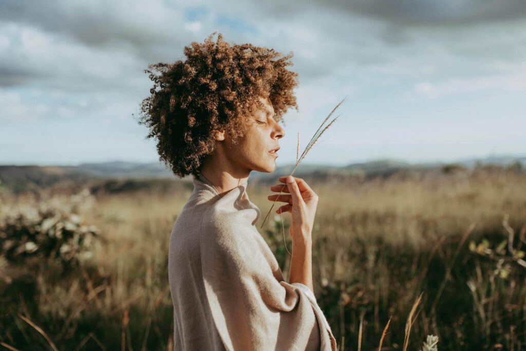 woman thinking in a field